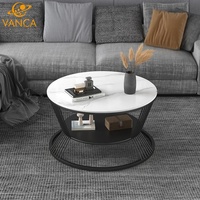 Ensemble de tables basses mobiles, plateau rond en pierre frittée, base en métal noir artistique, table d'appoint décorative moderne pour salon et maison