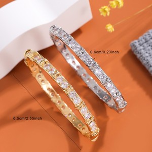 กำไลข้อมือเพชรซิร์คอนเต็มวง ดีไซน์รูปตัว X สีทอง/สีเงิน สไตล์ยุโรปอเมริกัน งานปาร์ตี้ ประดับเพชรแบบ Claw Setting ผลิตที่เมืองอี้หวู่ คอลเลคชั่นฤดูใบไม้ร่วง 2024 - Product Image 2