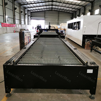 Machine de découpe laser à fibre CNC 1530 avec table de travail à échange automatique pour le traitement des tôles métalliques