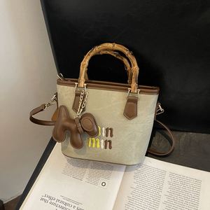 Sacs à main de luxe pour femmes, style bohème vintage, avec chaînes géométriques, fermeture éclair, bandoulière unique, design portable, résistant à l'eau - Collection 2025 - Product Image 4