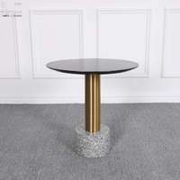 Table basse nordique moderne de luxe en pierre naturelle et en acier inoxydable doré avec dessus en bois rond noir