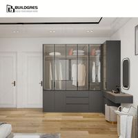 Système de dressing d'angle en bois en forme de L moderne avec portes coulissantes, design modulaire et coiffeuse intégrée