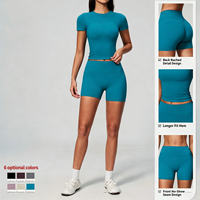 Ensemble short cycliste et crop top à manches courtes avec logo personnalisé pour femme, en tissu brossé, pour yoga et entraînement, vêtements de sport OEM