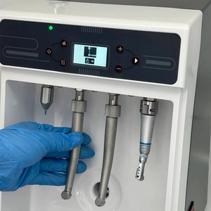 Máquina lubricadora de piezas de mano Holly Dental: Limpieza y mantenimiento inteligentes para piezas de mano de alta y baja velocidad - Product Image 1