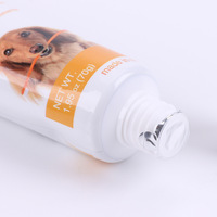 Venta al por mayor personalización eliminar el mal aliento sabor de carne de perro mascota pasta de dientes