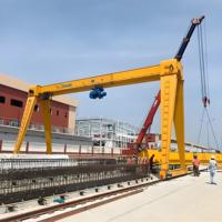 MH Type 12.5t 20t 25t 30t 40t 50t Capacité 10m-20m de portée Prix de la grue à portique à faisceau unique avec déplacement au sol