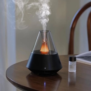 Diffuseur d'huiles essentielles à commande à distance avec logo personnalisé, humidificateur ultrasonique, design de diffuseur de lumière de bougie pour la maison - Product Image 1