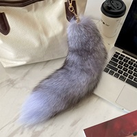 Breloque de sac en véritable fourrure de renard de luxe, pendentif queue d'animal surdimensionné et moelleux, porte-clés pour sacs à main de créateurs, cadeau décoratif