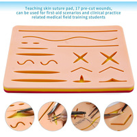 Kit d'entraînement aux sutures chirurgicales médicales : coussin de sutures en silicone pour plaies et ensemble d'outils de formation avec pinces