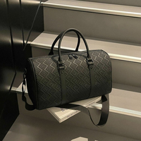 Sac de voyage week-end en PU gaufré géométrique OEM avec séparation sec/humide, bandoulière réglable, grande capacité