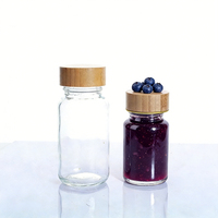 Petite bouteille en verre de 2 onces, shot de gingembre, 60 ml, bouteille ronde transparente pour jus, avec couvercle à vis en bambou hermétique, logo personnalisé