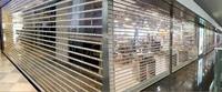 Rideau de magasin antivol de centre commercial Portes coulissantes transparentes et horizontales en acier inoxydable