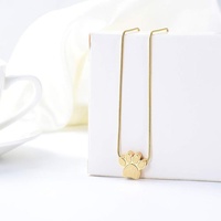 Collier urne funéraire ouvrable en acier inoxydable poli avec empreinte de patte de chien, pendentif minimaliste pour cendres, bijou commémoratif pour animaux de compagnie