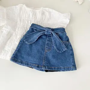 Produits d'été pour enfants Jupe en coton Fille Bébé Jupe en jean à nœud élastique pour filles Jupes en jean pour enfants