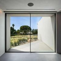 Porte d'entrée coulissante extérieure en verre sur mesure à trois rails et quatre panneaux, grande ouverture, gain de place, pour hôtel et villa
