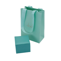 Maßgefertigte Papiertüten in Champagner-Gold, Elegante Verpackungstaschen mit Geprägtem Firmenlogo für Luxuriöse Einzelhandels- und Geschenkanlässe