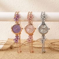 Jam Tangan Gelang Bunga Wanita Baru Jam Tangan Kuarsa Dial Merah Muda Emas Mawar Rantai Tarik Tali Dapat Disesuaikan Jam Tangan Gaun Modis Grosir