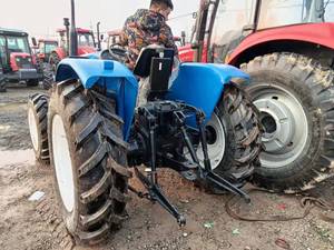 फ्रंट लोडर के साथ कम कीमत पर बिक्री के लिए अच्छी स्थिति में नए खोखले 704 70hp 4 व्हील ट्रैक्टर का इस्तेमाल किया - Product Image 3