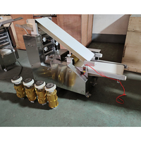 Machine automatique de formage de pita, chapati et roti, presse à pâte et machine de découpe pour usine de transformation alimentaire