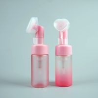 Distributeur de pompe de nettoyant pour le visage vide en plastique de 100ml avec mousse de silicone Massage tête de brosse propre savon bouteille moussante en plastique