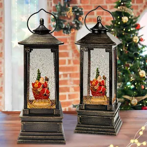 Hete Verkoop Batterij Werkende Led Kerst Santa In De Slee Kerst Water Globe Lantaarn