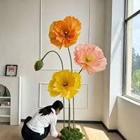 Grandes fleurs de pavot en papier crépon importées pour décorations de mariage et de vitrines
