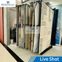 Free Standing Metal Carpet Display Rack with Page-Turning System for Large Area Rugs and Carpets in Retail Stores