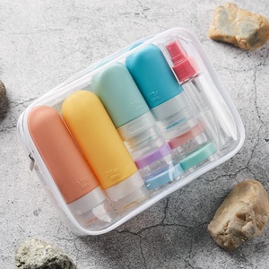 Ensemble de bouteilles de voyage en silicone anti-fuite Yuanze, contenants de toilette rechargeables orange/jaune/bleu pour shampoing, après-shampoing, lotion - Product Image 1