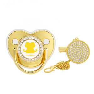 Venta caliente nuevo producto 12 Constelaciones chupete punto diamante bebé dorado comodidad jugar <span class=keywords><strong>boca</strong></span> con cubierta antipolvo - Product Image 1