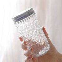 Bocal rond en verre au design moderne avec couvercle en métal à large ouverture pour la cuisine ou le camping pour le stockage des aliments