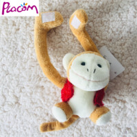 Singe en peluche magnétique en gros, singe à longues jambes avec veste rouge