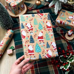 Papel de Regalo Navideño Kraft con Diseño de Árbol de Navidad y Santa Claus, 17 Pulgadas x 32.8 Pies, Papel Reciclable para Manualidades y Regalos, Uso Festivo - Product Image 2