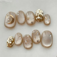 Luxe or étoile oeil de chat acrylique fait à la main court rond presse sur les ongles en gros marque privée faux ongles courts pour le doigt