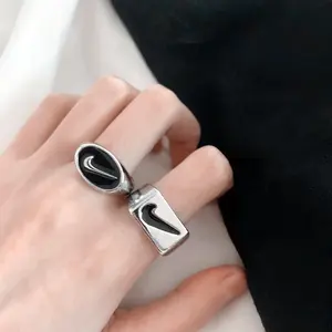 2021 New simple vintage Tick rings jewelry women mens Creativity hip hop stainless steel couple openCurved Hook Logo ring