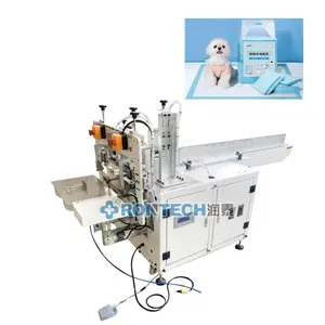 High speed full automatic baby diaper packing machine high speed disposable under pads bed sheet sanitary napkin packing machine