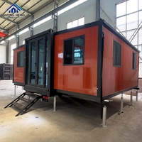 Maison préfabriquée modulaire moderne à toit en pente de 20, 30 ou 40 pieds avec porche avant couvert pour maison de vacances type conteneur