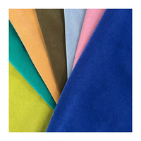 Vente en gros de tissu de velours tricoté de luxe bleu uni pour rideaux