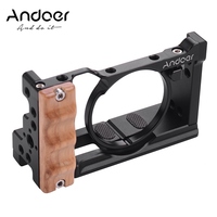 Andoer Cage d'appareil photo en métal et aluminium pour Sony RX100 VI/VII avec support de sabot froid 1/4 vis poignée en bois Vlogging
