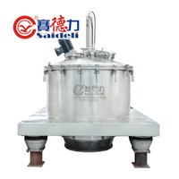 Centrífuga de descarga inferior con raspador vertical, especialmente diseñada para materiales inflamables y explosivos de alta viscosidad y granulación fina.