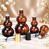 Flacon roll-on en verre ambré opaque en forme de gourde pour huile essentielle, flacon roll-on à bille en acier pour huile de massage beauté