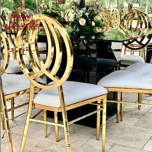 Noleggio sedia da pranzo in metallo bianco in pelle dorata per banchetti