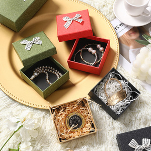 Boîtes rigides personnalisées pour bijoux et parfums, fabriquées par Nicro Original Factory, avec doublure en éponge, ruban et nœud, en carton écologique. - Product Image 2