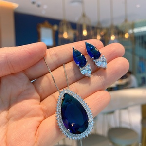Parure de bijoux pour femme en cuivre écologique, avec collier et boucles d'oreilles en zircon bleu en verre taille poire 15*25mm, motif goutte d'eau, idéal pour un cadeau - Product Image 1