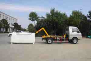 Camión de basura de elevación de <span class=keywords><strong>gancho</strong></span> hidráulico diésel compacto con caja de cambios 4x2 Drive para maniobrar fácilmente en áreas urbanas abarrotadas - Product Image 3