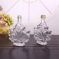 Fabricant de petites bouteilles en verre de 250 ml, 100 ml, 50 ml pour sirop d'érable, vin, forme plate, bouchon à vis, vente en gros, sérigraphie