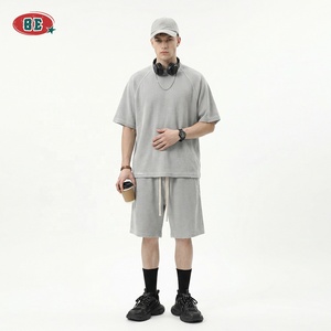 Fabricants de T-shirts en tricot gaufré, ensembles de T-shirts amples grande taille vierges, ensembles de T-shirts pour hommes à col ras du cou et épaules tombantes avec logo personnalisé - Product Image 1