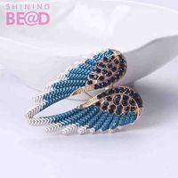 Nouvelle Broche de Luxe en Strass Ailes d'Ange et Plumes pour Vêtements et Bijoux, Idéale pour Mariages, Fêtes et Cadeaux pour Femmes