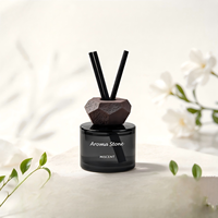 Diffuseur d'arômes en pierre volcanique noire personnalisé de luxe en gros pour la décoration intérieure et les coffrets cadeaux
