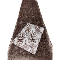 Nouveau design France, dentelle perlée dorée, tissu en maille à sequins et perles pour robes de mariée