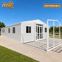 Maison conteneur modulaire extensible à double aile de 40 pieds, toit en pente, terrasse, structure blanche, pour usage scolaire chinois, cuisine en quartz et marbre